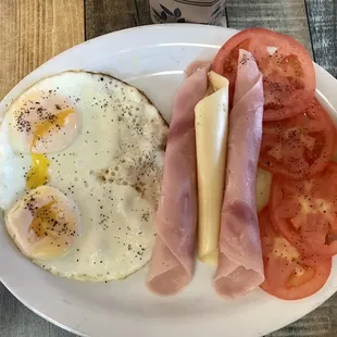 Breakfast with over cooked eggs