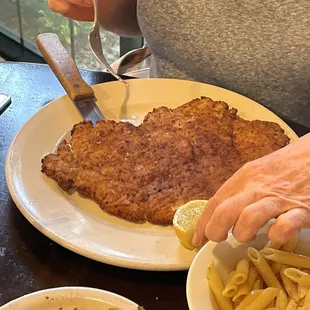 Pork Milanese is her favorite, but she's never been able to finish it in one sitting.