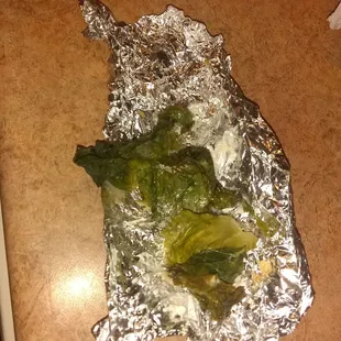a piece of broccoli wrapped in foil