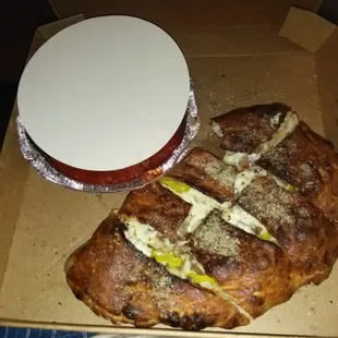 A little burned; yet still delicious!... beef, sausage, onions, banana peppers