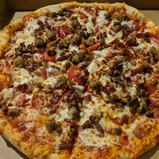 Kings feast, meaty and loaded, slightly undercooked dough but still fantastic .