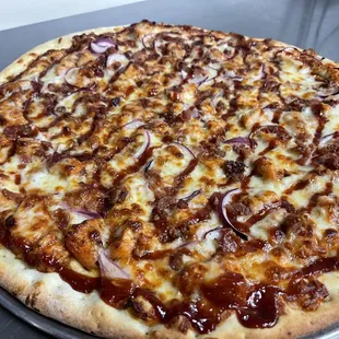 BBQ Chicken Pizza (cheese, chicken, bacon, red onion, and bbq sauce)