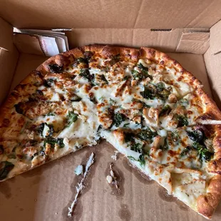 a whole pizza in a box