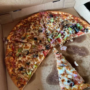 a whole pizza in a box