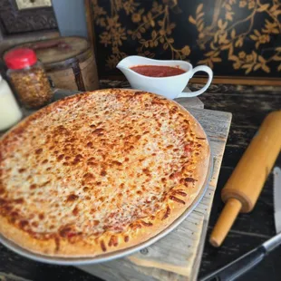 Cheese Pizza, crispy crust, rich tomato sauce, and melted mozzarella. Add your favorite toppings!