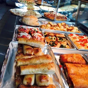 a variety of different types of pizzas