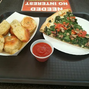 A slice of pie, six garlic knots and a large drink will only set you back $10.