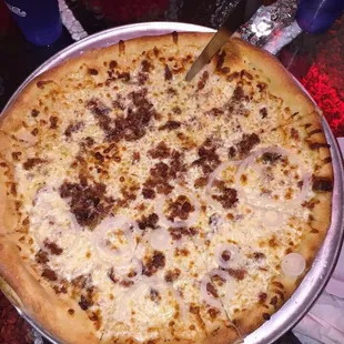 Cheesy sauce bacon and onion pizza