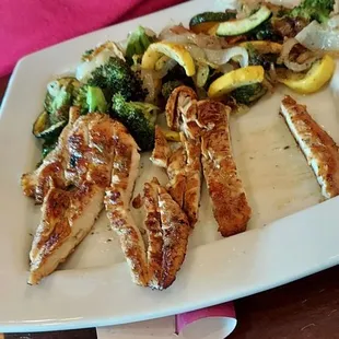 A grilled chicken &amp; vegetable dish not on the menu but custom-made for one of our group.