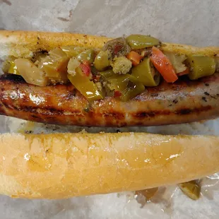 Hot Doug&apos;s Atomic sausage is now at Roma&apos;s. It has a higher fat content and different spice profile, somewhere between a brat and Polish.