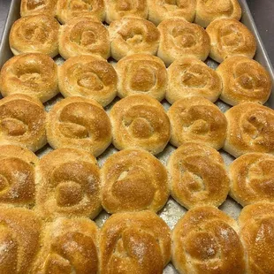 a tray of freshly baked bread rolls