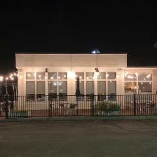 The patio with outdoor seating and tables.