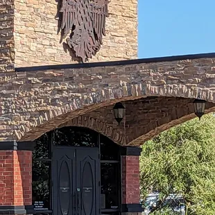 the entrance to a brick building