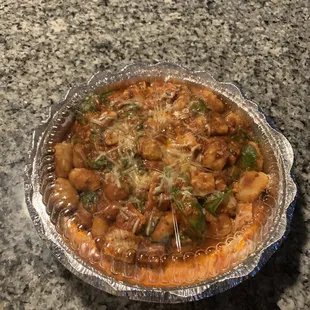 Gnocchi, chicken and spinach in a spicy red sauce
