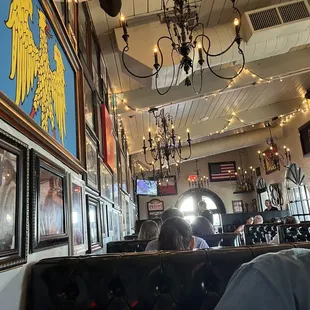 Dining area- tons of chandlers and paintings on the walls