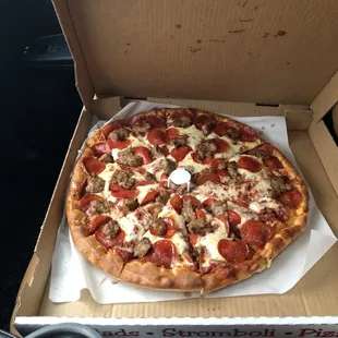 pepperoni, sausage, and cheese pizza