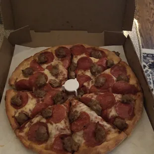 a pepperoni and sausage pizza
