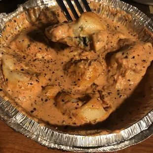 ​Tortellaci Hand made pasta (thick tortellini-like) filled with cheese and spinach. 10/10 and we got it carry-out!