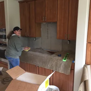 Lisa installing the back splash ...
