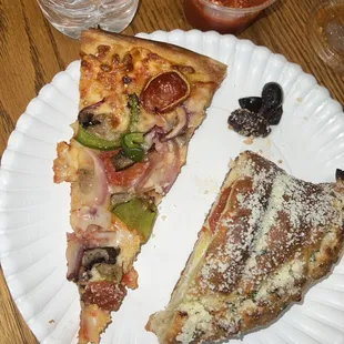 Romanos pizza and pepperoni calzone