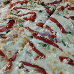In the slices today
Roasted red peppers,spinnach with feta on a white base pizza