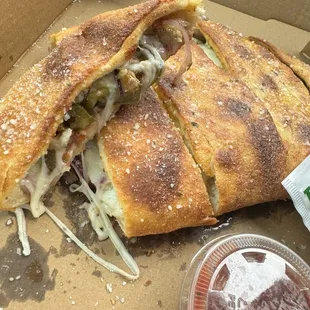 Small sausage, jalapeño and onion calzone...