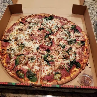 Choice of 3 topping large pizza - special for $10.99. Chose pepperoni, spinach and mushrooms.