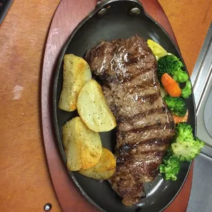 a steak and potatoes
