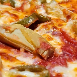 a close up of a pizza