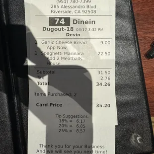 Receipt with an extra charge for using my card. No where is it posted that you get charged for using your card