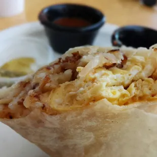 Egg, cheese, and potato breakfast burrito.
