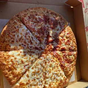 Gorgeous pizza with crunchy lower and chewy upper crust, melted cheese and beautiful sauce