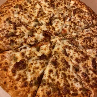 Large sausage and pepperoni pizza on regular crust