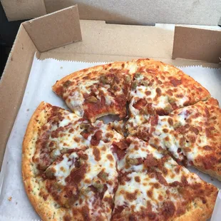 Small sausage and pepperoni pizza