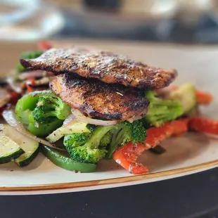 Grilled chicken with vegetables.