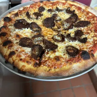 Homemade sausage pizza