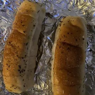 Hot dog buns with seasoning as garlic bread