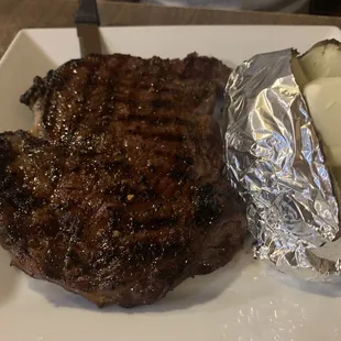 Medium Rare Steak with Baked Potato yum