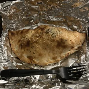 Sausage Calzone (Sausage, Ricotta, Mozzarella, Green Peppers, and Onions)