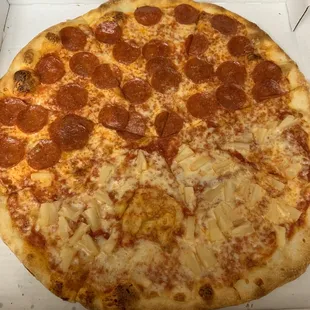 Half pineapple and half pepperoni pizza. It was delicious.