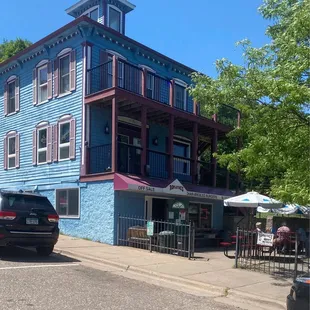 a blue building with a clock tower