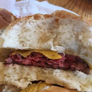 Burger raw x 2. Waiter put the existing burgers back on the grill and brought it back again like this.