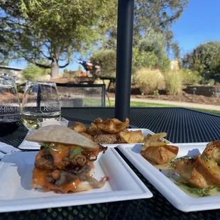 Cracked potatoes, mini crispy chicken sandwich and shrimp wontons.