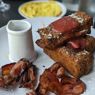 French toast sticks, bacon and scrambled eggs