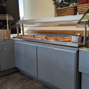 The pizza buffet has 4 pizzas, but when we went, they'd been sitting a long time, turning us off.