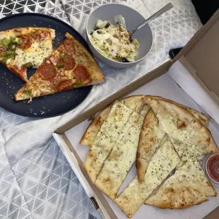 Large Garlic Bread Large Grilled Chicken Salad and pizza  More than enough for two people to share.