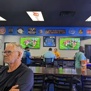 Sports bar with 16 HUGE TVs!