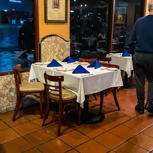 a man standing in a restaurant