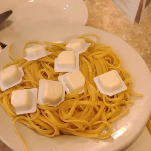 I ordered buttered noodles and this is what they brought me. Waitress said &quot;Give it a minute, the butter is melting.&quot;