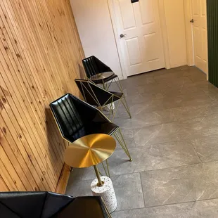 a row of chairs in a hallway